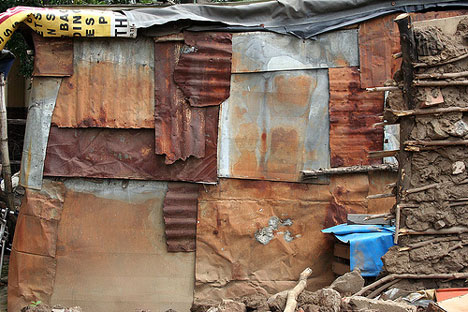 informal-settlement-1 recycled metal in African shack home