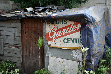 recycled signage and wood in an informal settlement